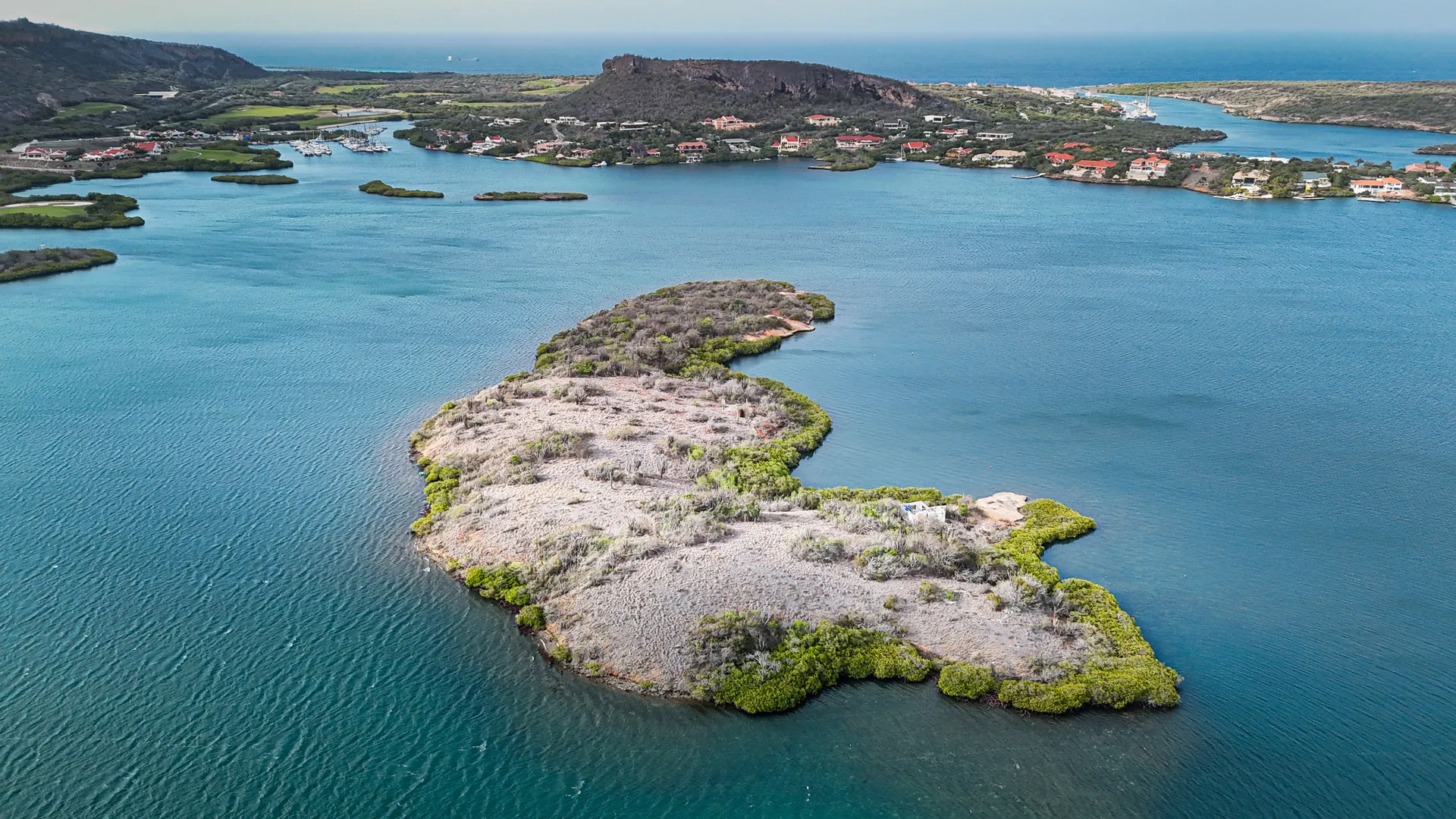 Aerial photograph of Isla di Yerba within Spanish Water, Curaçao, as it exists today.